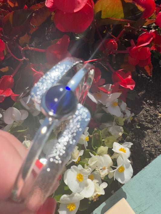 Heavy silver plated bangle with handmade 8mm glass cabochon (crackle finish)