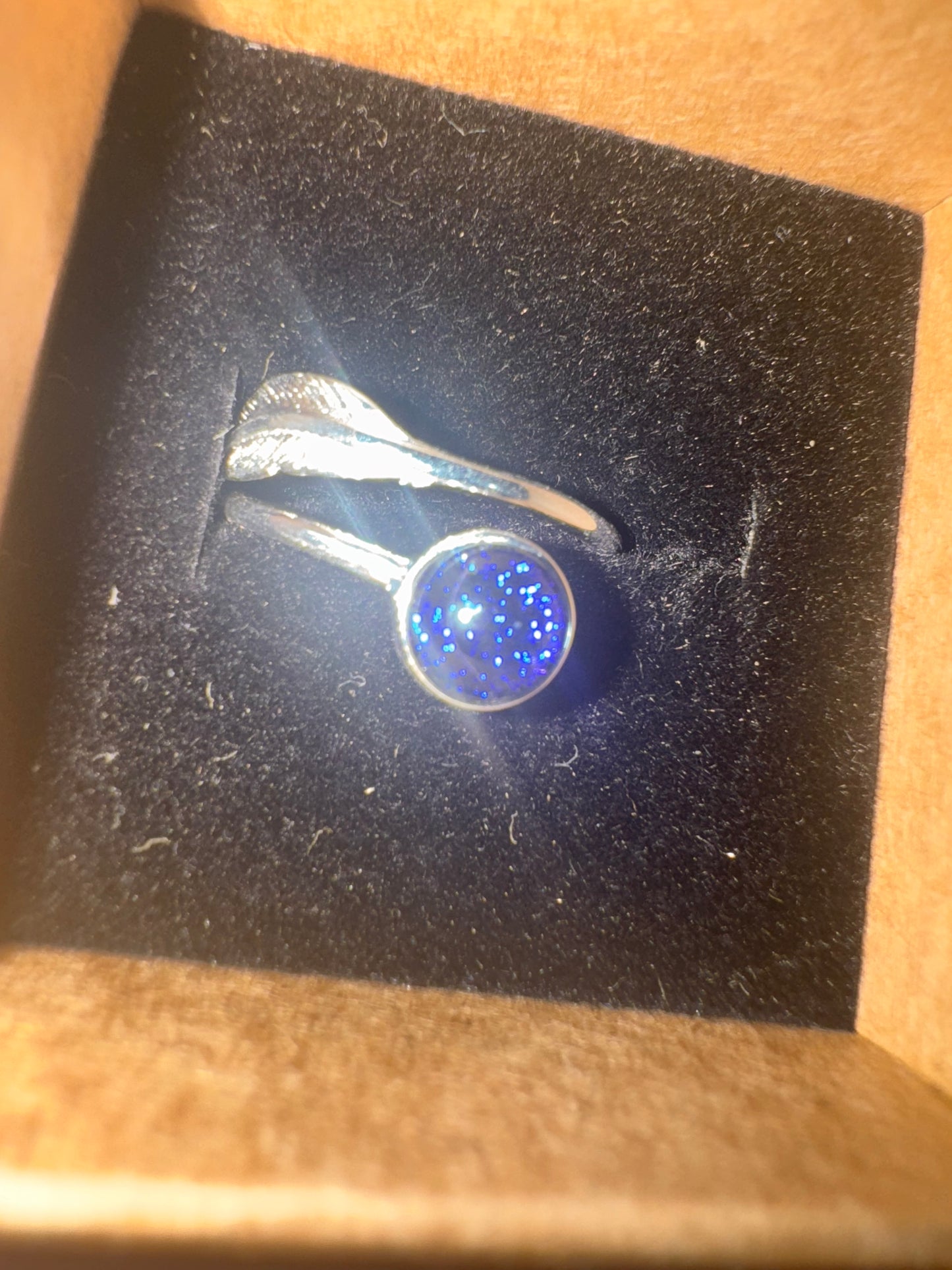 Sterling silver adjustable feather ring with handmade fused glass cabochon